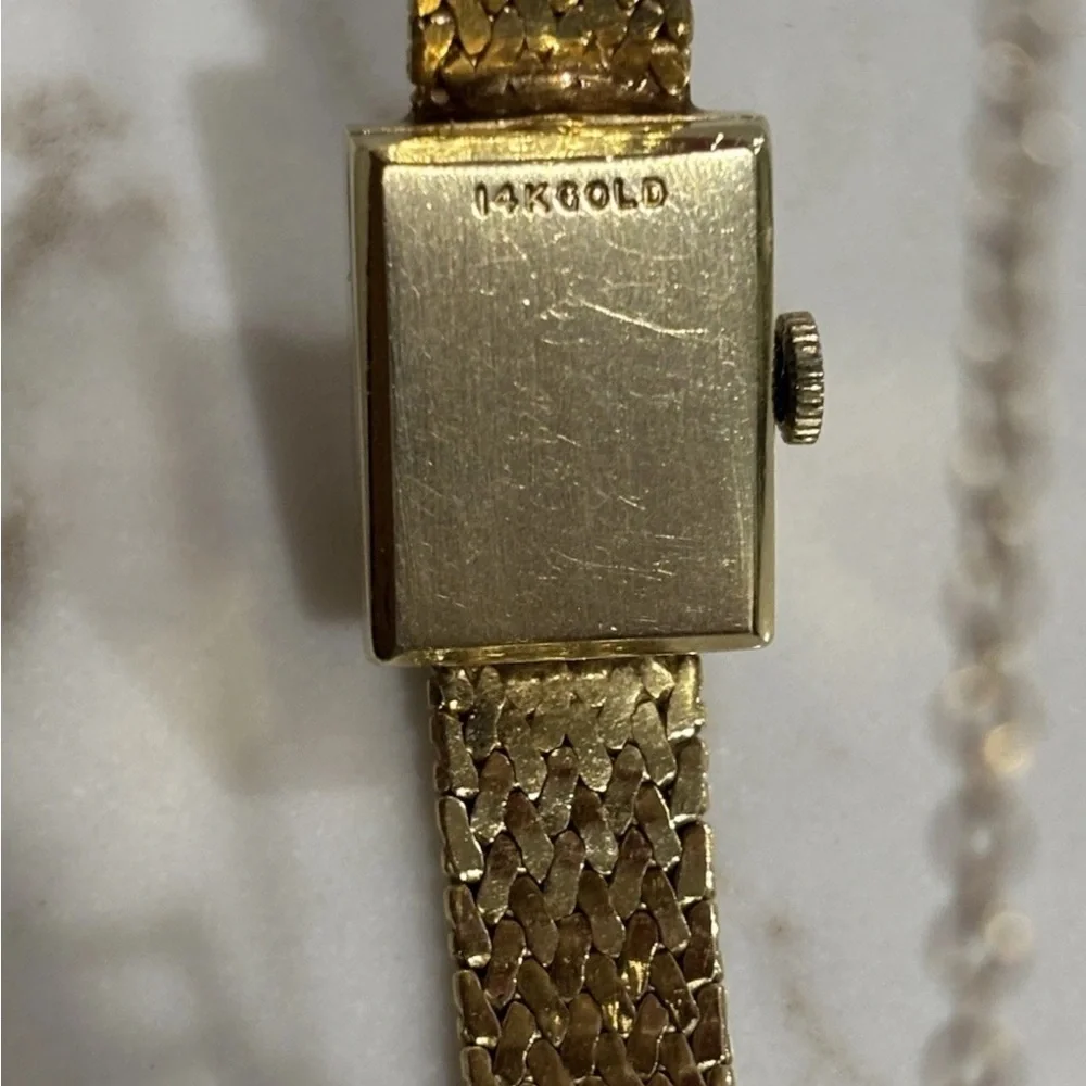 14K Ladies Hidden Watch with Floral Motif on Cover by Geneva 6.5” 23.74 grams - Picture 3 of 4